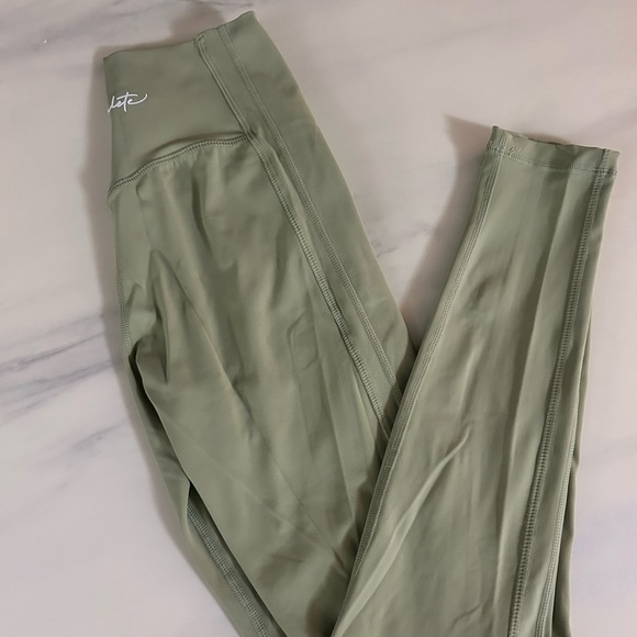 Almost brand new alphalete leggings. Size Md. Medium compression. Sage green. - Picture 2 of 5